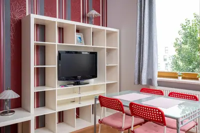 Telewizja i/lub zestaw kina domowego w obiekcie Obrzeżna Standard Apartment by BookingHost