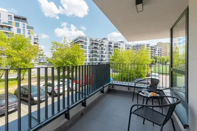 Balkon lub taras w obiekcie Modern Family Apartment with Parking by Noclegi Renters