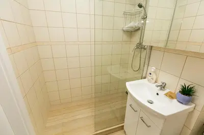 Łazienka w obiekcie Chmielna - 250m od Złotych Tarasów, 350m od Dworca Centralnego - Wifi - Smart TV 55 cali - Better Rental