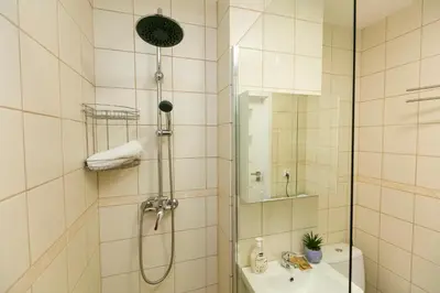 Łazienka w obiekcie Chmielna - 250m od Złotych Tarasów, 350m od Dworca Centralnego - Wifi - Smart TV 55 cali - Better Rental