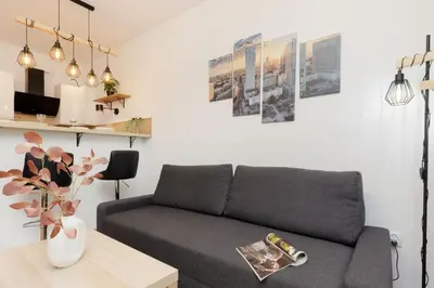Część wypoczynkowa w obiekcie Roomy Apartment Oczapowskiego in Bielany by Noclegi Renters