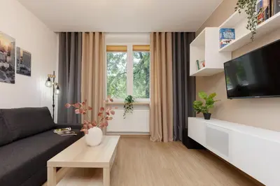 Telewizja i/lub zestaw kina domowego w obiekcie Roomy Apartment Oczapowskiego in Bielany by Noclegi Renters