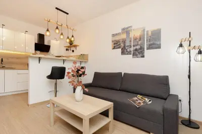 Część wypoczynkowa w obiekcie Roomy Apartment Oczapowskiego in Bielany by Noclegi Renters
