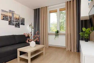 Część wypoczynkowa w obiekcie Roomy Apartment Oczapowskiego in Bielany by Noclegi Renters