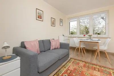 Część wypoczynkowa w obiekcie Dickens St Apartment Warsaw by Noclegi Renters