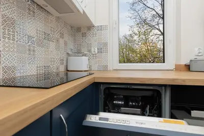 Kuchnia lub aneks kuchenny w obiekcie Dickens St Apartment Warsaw by Noclegi Renters