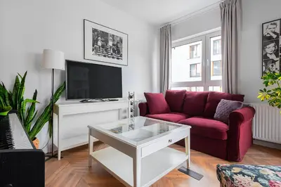 Telewizja i/lub zestaw kina domowego w obiekcie Charming Apt close to the Center