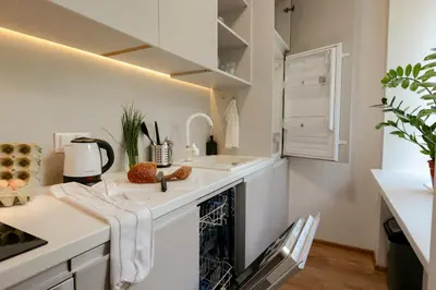 Kuchnia lub aneks kuchenny w obiekcie Jana Pawła II 36 - Bezpłatny podziemny garaż - Free Parking - W pełni wyposażone studio - Better Rental