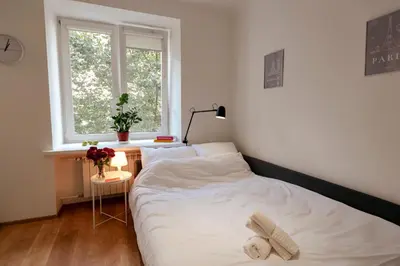 Łóżko lub łóżka w pokoju w obiekcie Jana Pawła II 36 - Bezpłatny podziemny garaż - Free Parking - W pełni wyposażone studio - Better Rental