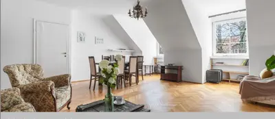 Część wypoczynkowa w obiekcie Apartament w kamienicy na Starym Mieście