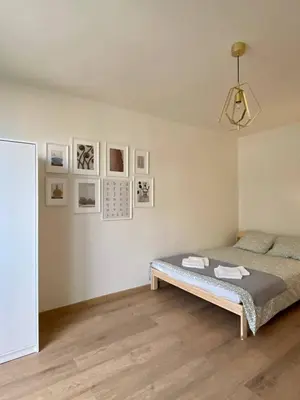 Łóżko lub łóżka w pokoju w obiekcie HALBY rooms Pereca 13/19