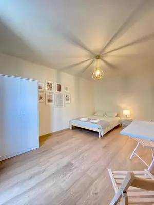 Łóżko lub łóżka w pokoju w obiekcie HALBY rooms Pereca 13/19