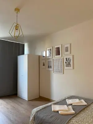 Łóżko lub łóżka w pokoju w obiekcie HALBY rooms Pereca 13/19