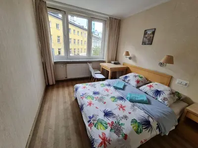 Łóżko lub łóżka w pokoju w obiekcie Fantastic Waw - Z6 Room - 101A
