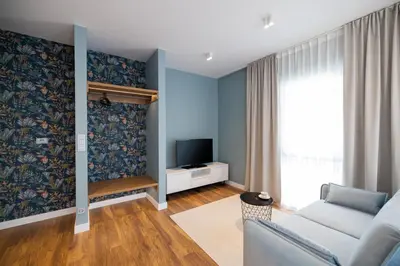 Telewizja i/lub zestaw kina domowego w obiekcie B85 Suites
