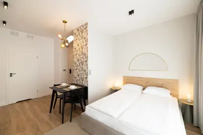 Łóżko lub łóżka w pokoju w obiekcie B85 Suites
