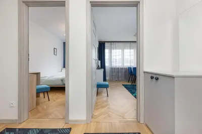 Łóżko lub łóżka w pokoju w obiekcie Cozy and Comfortable Wola Apartment by Noclegi Renters