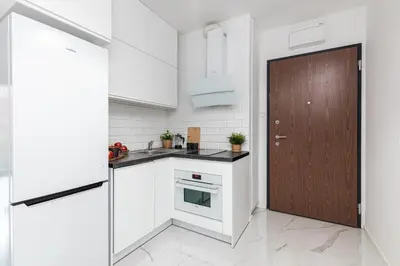 Kuchnia lub aneks kuchenny w obiekcie SuperApart Strzelecka 24 - Praga, metro Szwedzka