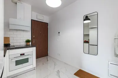 Kuchnia lub aneks kuchenny w obiekcie SuperApart Strzelecka 24 - Praga, metro Szwedzka