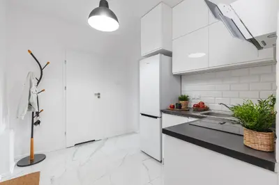 Kuchnia lub aneks kuchenny w obiekcie SuperApart Strzelecka 24 - Praga, metro Szwedzka