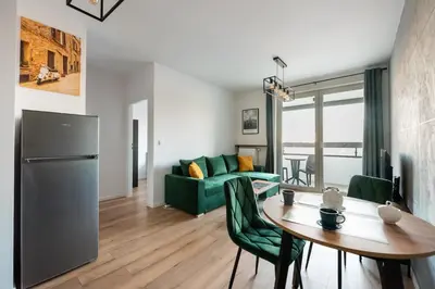 Część wypoczynkowa w obiekcie Nova Sfera Green Apartment by BookingHost