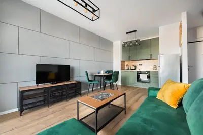 Kuchnia lub aneks kuchenny w obiekcie Nova Sfera Green Apartment by BookingHost