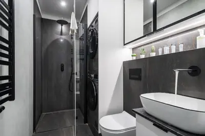 Łazienka w obiekcie Wola Tower Deluxe Separate Bedroom with Free Garage - by Perfect Apart