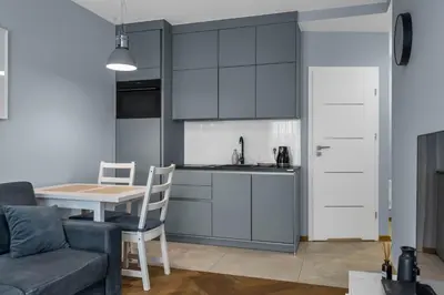 Kuchnia lub aneks kuchenny w obiekcie Warsaw Airport Studio with Private Terrace