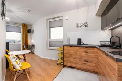 Kuchnia lub aneks kuchenny w obiekcie Wiktoryn 6 by Homeprime