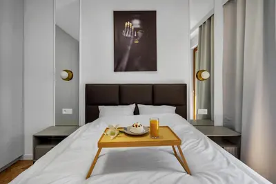 Łóżko lub łóżka w pokoju w obiekcie Kasprzaka 29A Business Apartments N1 - Parking, Balcony, Targi Expo - by Rentujemy