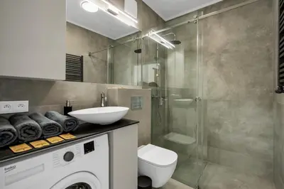 Łazienka w obiekcie Kasprzaka 29A Business Apartments N1 - Parking, Balcony, Targi Expo - by Rentujemy