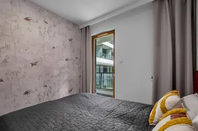 Łóżko lub łóżka w pokoju w obiekcie Kasprzaka 29A Business Apartments N2 - Parking, Balcony, Targi Expo - by Rentujemy