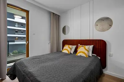 Łóżko lub łóżka w pokoju w obiekcie Kasprzaka 29A Business Apartments N2 - Parking, Balcony, Targi Expo - by Rentujemy