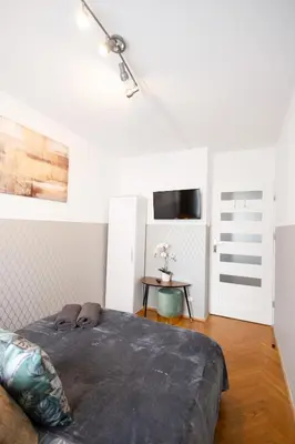 Łóżko lub łóżka w pokoju w obiekcie ClickTheFlat Stawki Apart Rooms