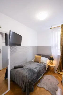 Łóżko lub łóżka w pokoju w obiekcie ClickTheFlat Stawki Apart Rooms