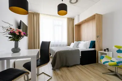 Łóżko lub łóżka w pokoju w obiekcie Al. Jerozolimskie 216 Perfect Apart