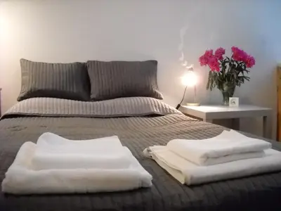 Łóżko lub łóżka w pokoju w obiekcie A może na Pańskiej?