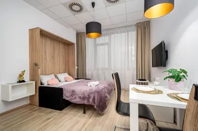 Telewizja i/lub zestaw kina domowego w obiekcie Al Jerozolimskie 216 APART-WAWA