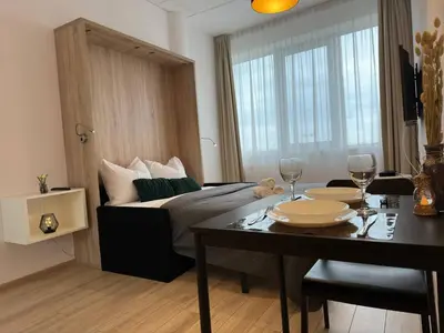Łóżko lub łóżka w pokoju w obiekcie Al Jerozolimskie 216 APART-WAWA
