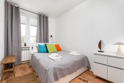 Łóżko lub łóżka w pokoju w obiekcie Kasprowicza 15 by Homeprime