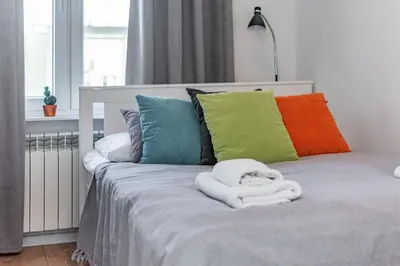 Łóżko lub łóżka w pokoju w obiekcie Kasprowicza 15 by Homeprime