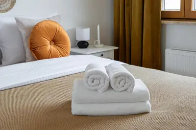 Łóżko lub łóżka w pokoju w obiekcie Białego Dębu Cosy Apartment by BookingHost