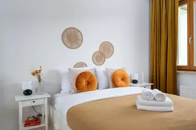 Łóżko lub łóżka w pokoju w obiekcie Białego Dębu Cosy Apartment by BookingHost