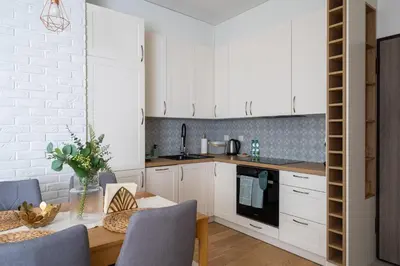 Kuchnia lub aneks kuchenny w obiekcie Białego Dębu Cosy Apartment by BookingHost