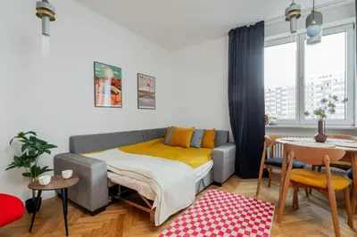 Łóżko lub łóżka w pokoju w obiekcie Orchard Apartment City Center