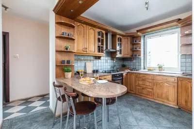 Kuchnia lub aneks kuchenny w obiekcie ROOM Powstańców Śląskich 61