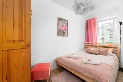 Łóżko lub łóżka w pokoju w obiekcie Warsaw Concierge Srebrna