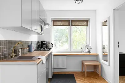 Kuchnia lub aneks kuchenny w obiekcie Warsaw Concierge Srebrna