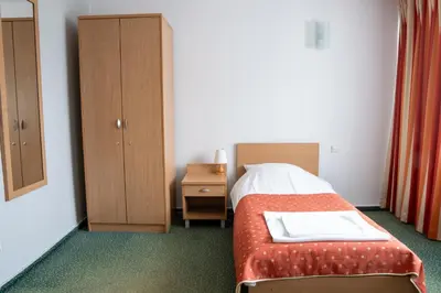 Łóżko lub łóżka w pokoju w obiekcie Hotel Wilanów