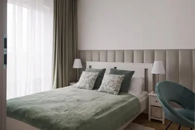 Łóżko lub łóżka w pokoju w obiekcie La Boutique Verte